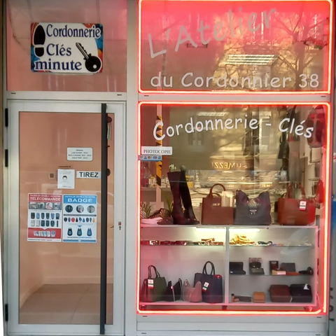 l'atelier du cordonnier 38 Logo